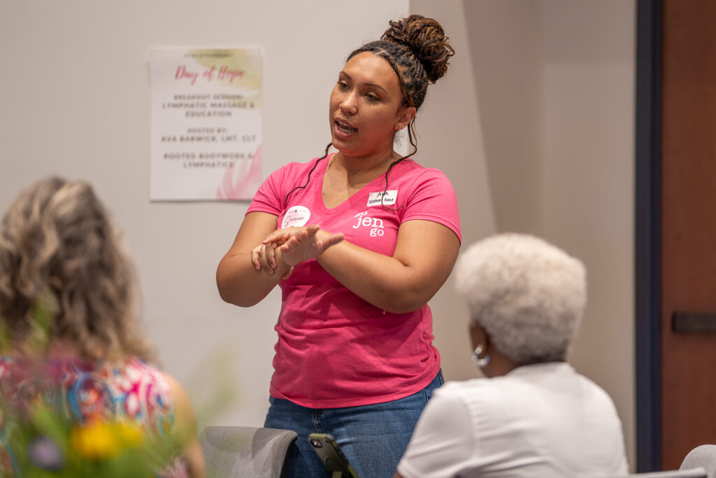 Ava leading an education session on self-lymphatic massage