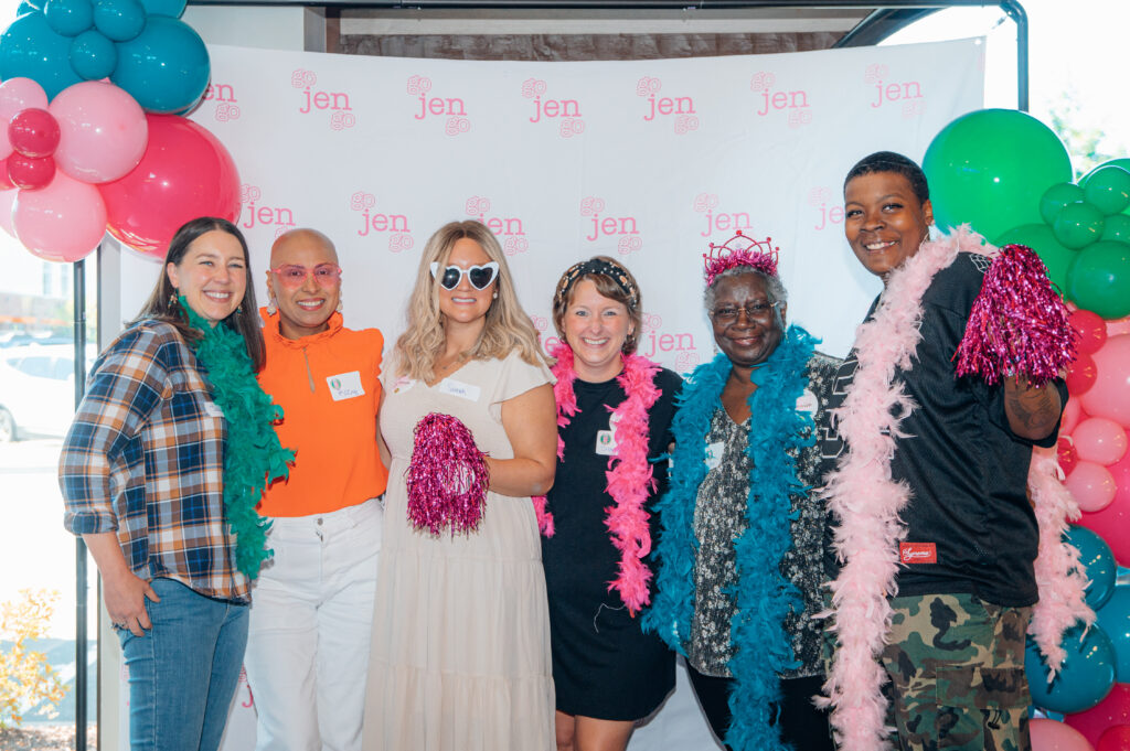 group photo of several Go Jen Go Grantees at Cheers Jen Cheers event
